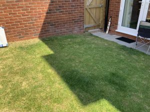 12m² timber decking on a sloping new-build garden, Stone, Staffordshire