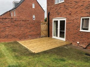 12m² timber decking on a sloping new-build garden, Stone, Staffordshire