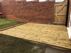12m² timber decking on a sloping new-build garden, Stone, Staffordshire