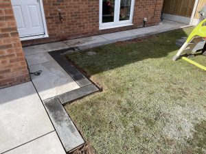 Porcelain patio and new turf work under way, Stone, Staffordshire