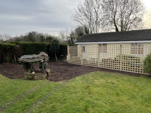 New fence panels and ground cleared with a digger ready for turf, Staffordshire garden