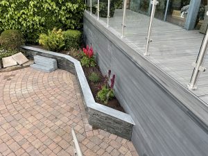 Composite wall cladding and composite fence panels with aluminium posts, Staffordshire garden