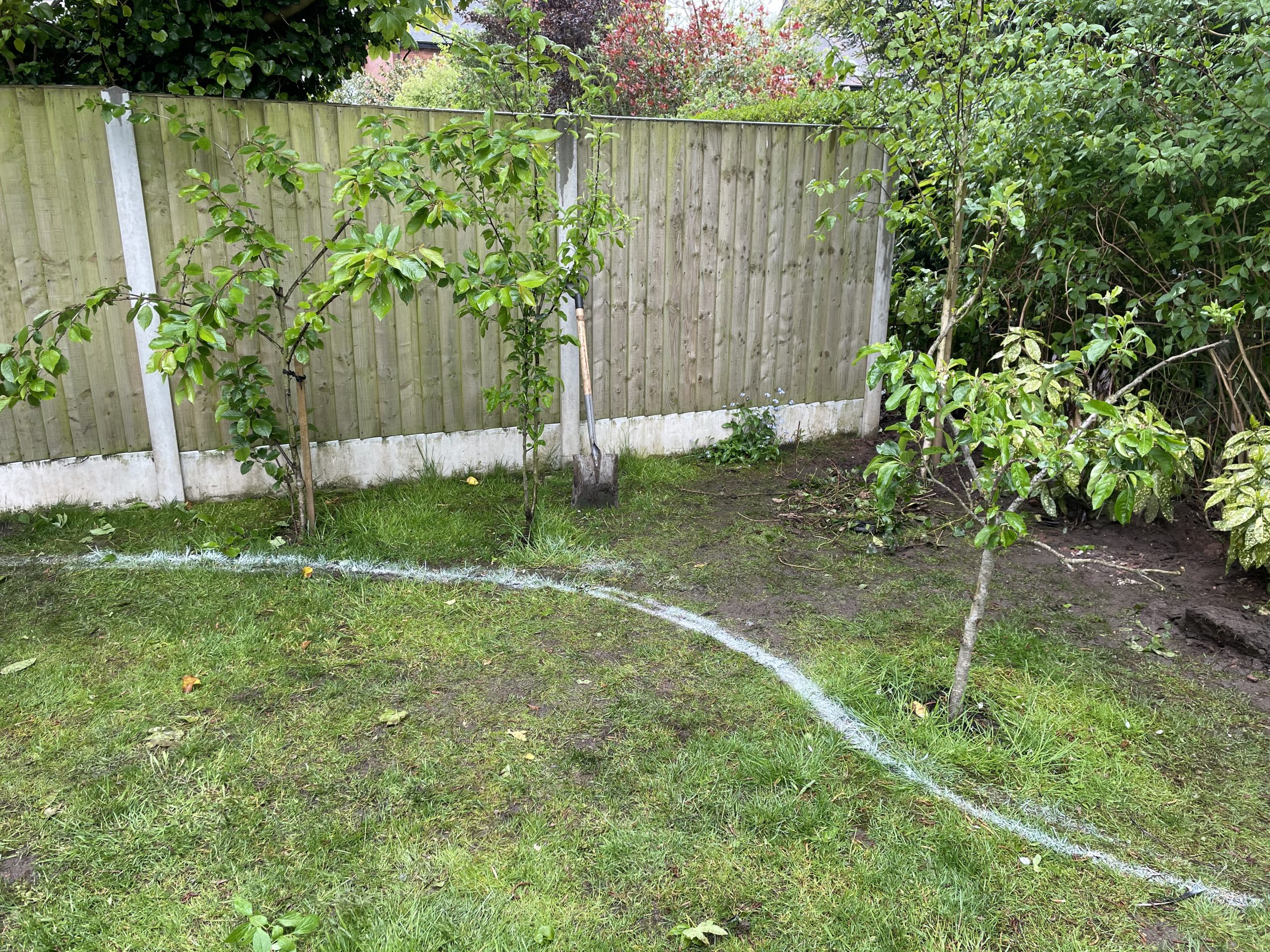 Garden in Stone before work started, existing patio and lawn