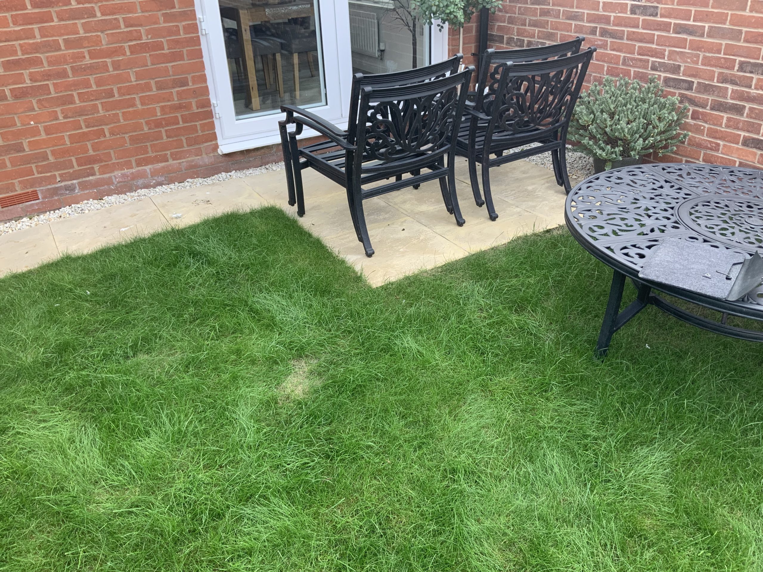 Small rear patio in Stone before the riven paving extension