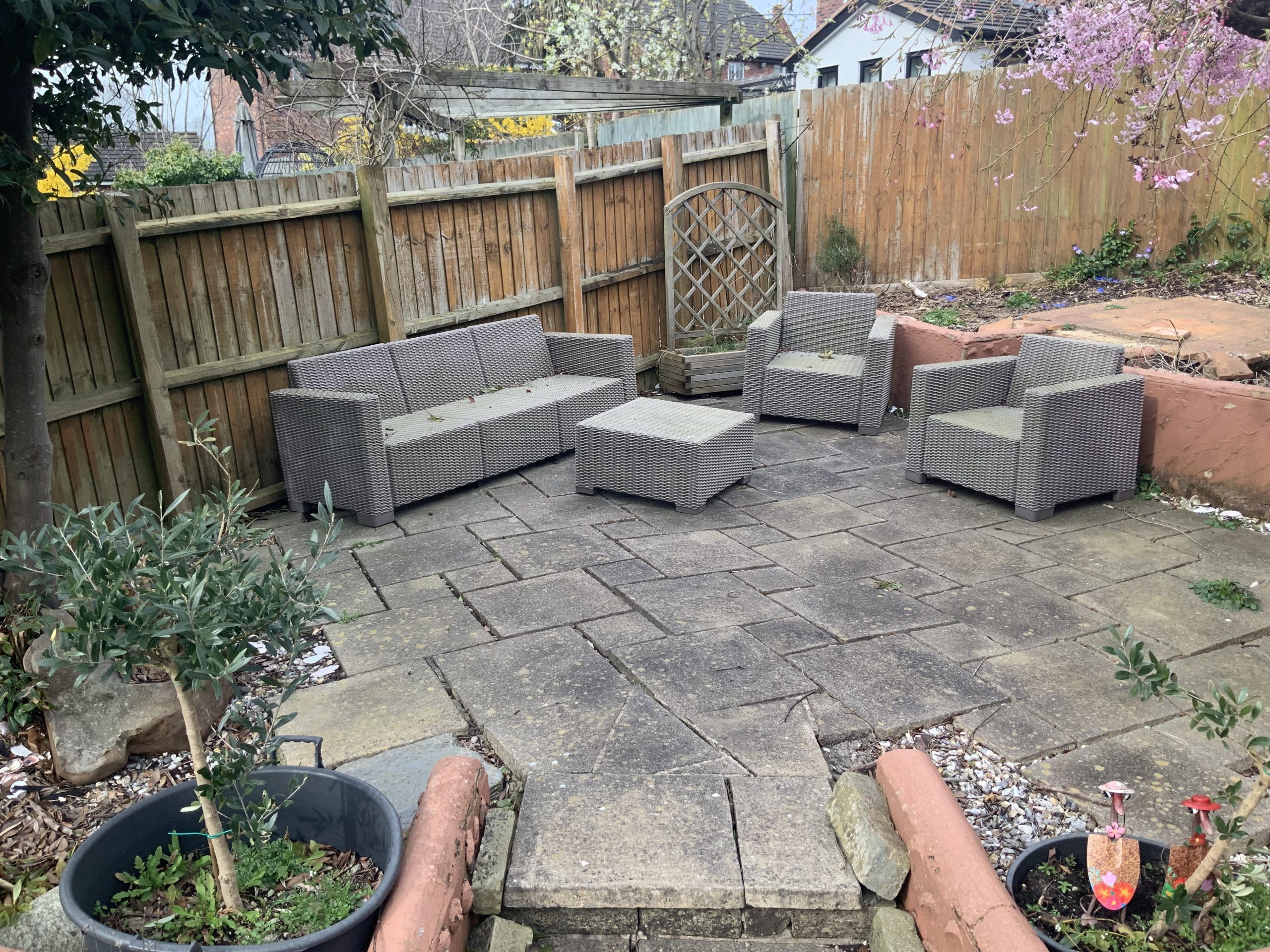 Old patios before the two-level garden makeover, Stone