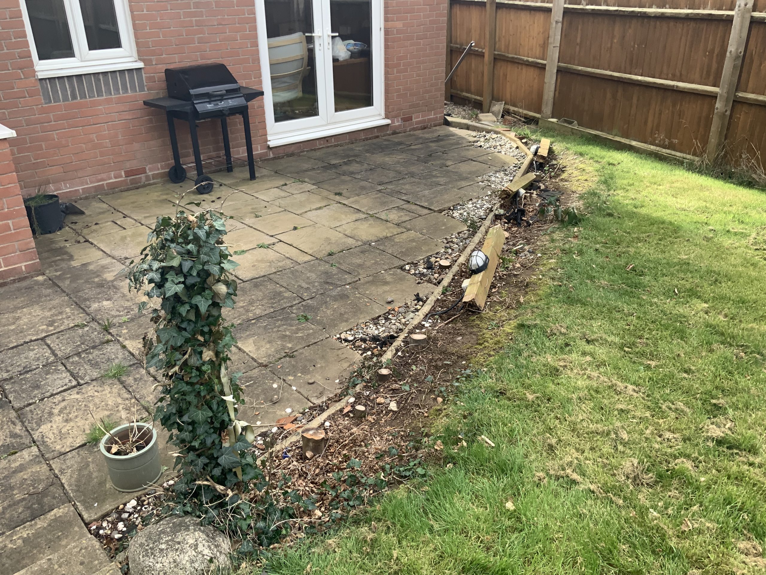 Garden before new natural stone patios, Stone