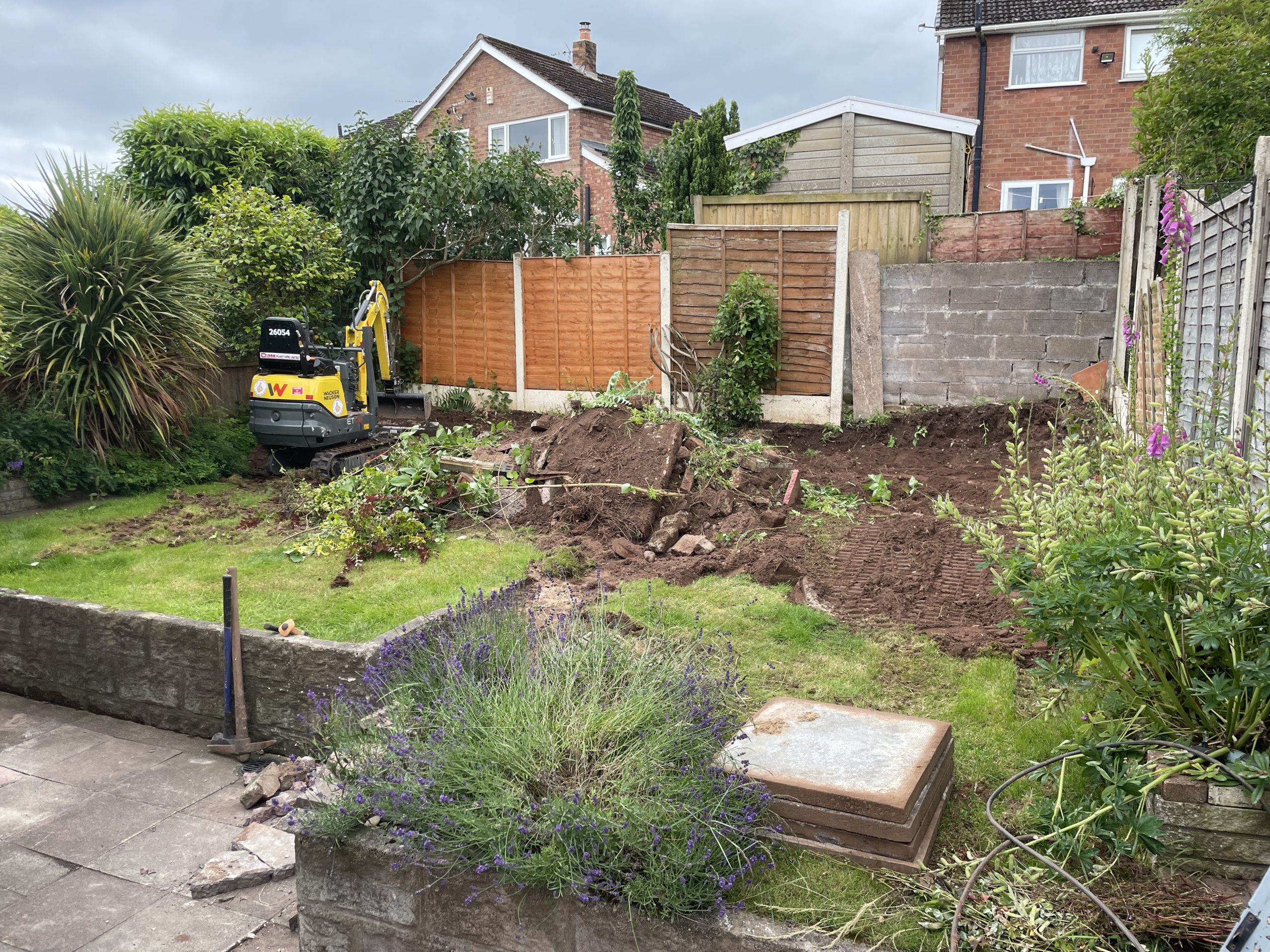 Excavation and levelling of a sloping garden, Tittensor