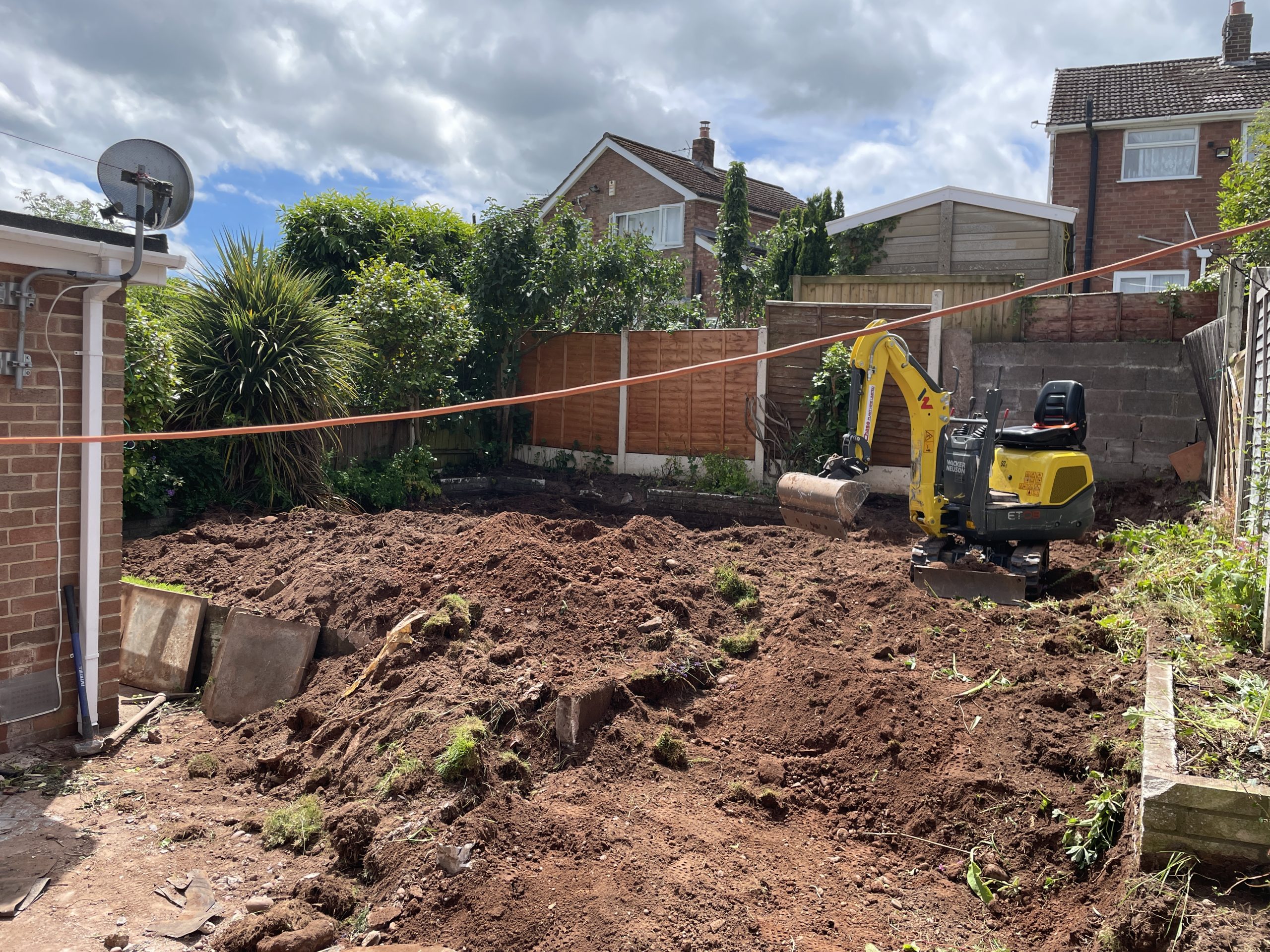 Breaking out the concrete shed base and levelling the garden, Tittensor
