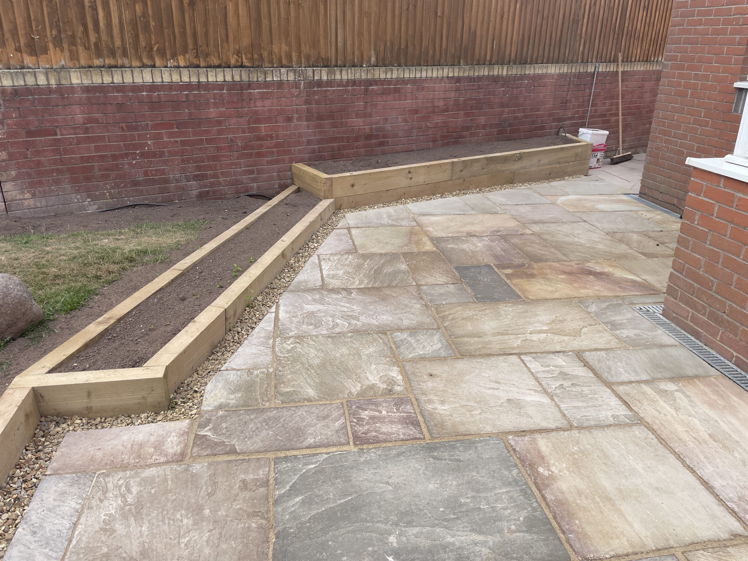 Finished natural stone patios, curved path and steps, Stone
