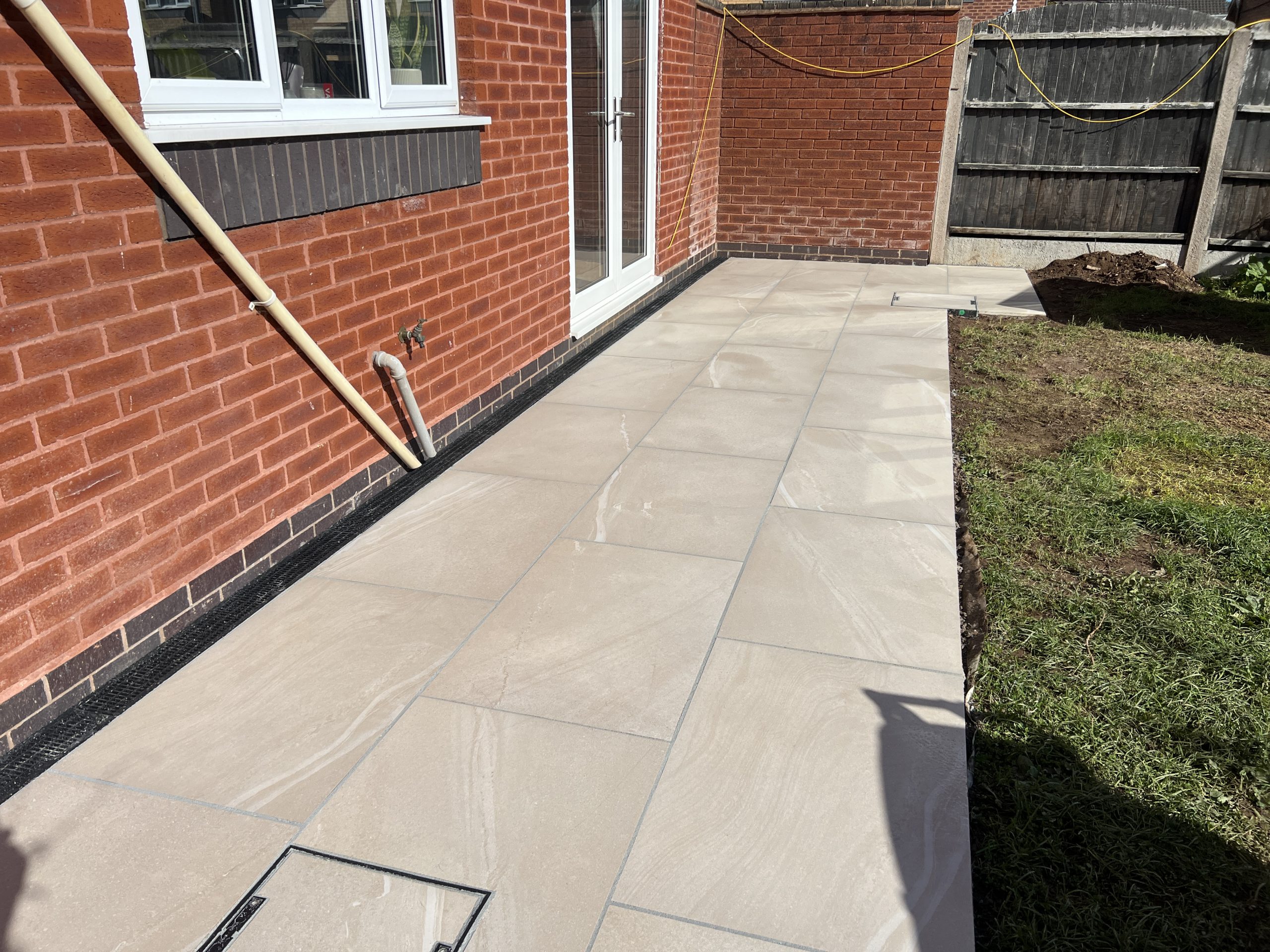 20m² Galaxy Sand porcelain patio with ACO drain and Titan resin grout, Stone, Staffordshire